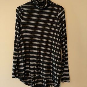 Black and white striped turtleneck.